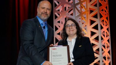TMS President Brad Boyce presents Pinar Acar with her award for Frontiers of Materials. Photo courtesy of TMS.