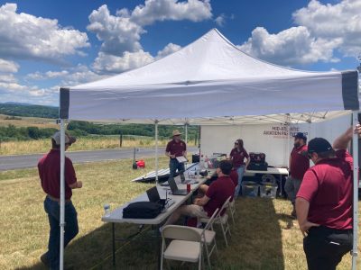 Virginia Tech Mid-Atlantic Aviation Partnership Employees work in the field